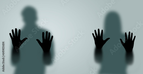 Hands touching blue glass. Scream for help		