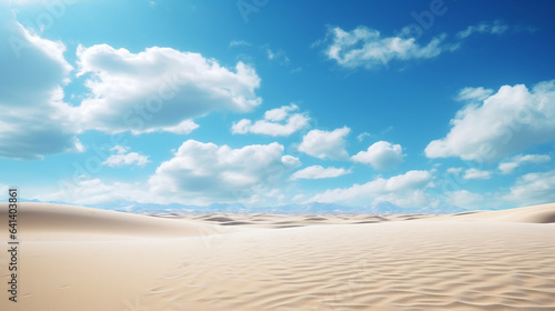 a blue sky over a sandy beach under the sun 