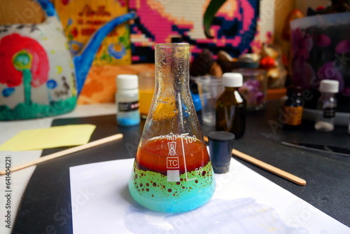 Chemical flask close-up. Conducting chemical experiments at home.