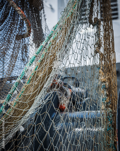 Close-up shot of old fishermen's fish nets