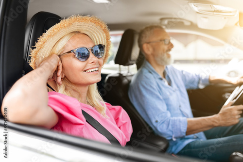 Happy senior man and woman going car trip together © Prostock-studio