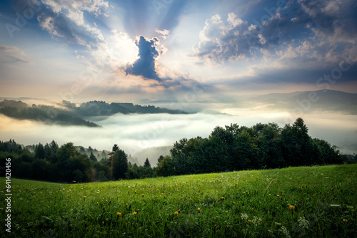 Morning inversion over the village of Huslenky in the Beskydy Mountains. Wallachia, Czech Republic photo