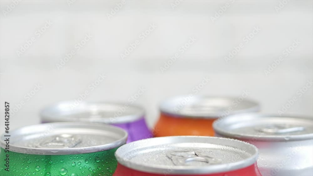 Various Cold, Sweet, and Carbonated Refreshing Drinks. Shooting with Refreshing Pop Can Drinks. Various Cold, Sweet, and Carbonated Refreshing Drinks. Shooting with Refreshing Pop Can Drinks.
