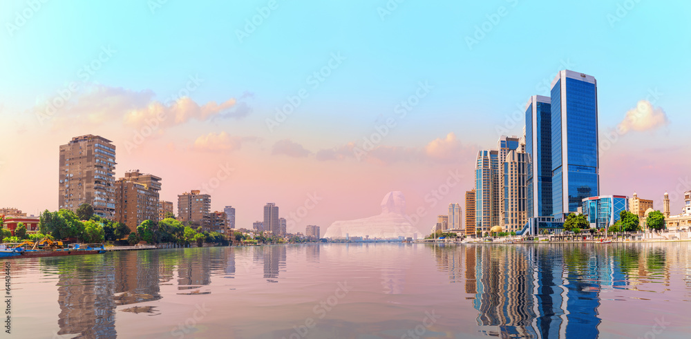 Cairo downtown reflecting in the waters of Nile river, beautiful sunset scenery, Egypt