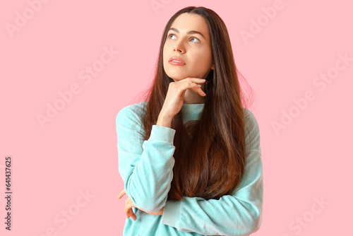 Thoughtful young woman on p...