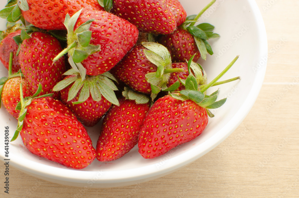 Delicacy and flavor in a close-up of fresh homemade strawberries, an invitation to indulge. Delicacy and flavor in a close-up of fresh homemade strawberries, an invitation to indulge.
