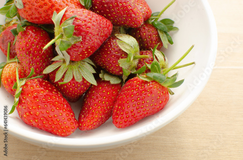 Delicacy and flavor in a close-up of fresh homemade strawberries  an invitation to indulge.