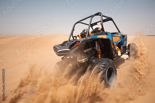sand dune bashing ofrroad. utv rally buggy photo