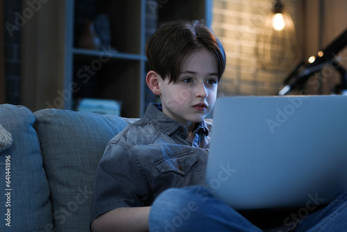 Little boy doing homework w...