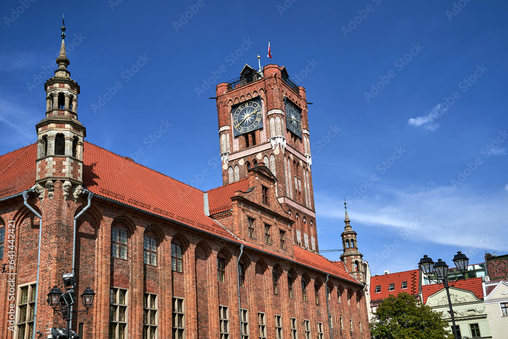 historic medieval town hall with clock tower in Torun