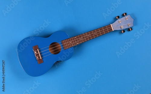 blue small ukulele isolated