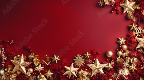 Christmas background with red and gold stars and snowflakes on red. Top view with copy space.