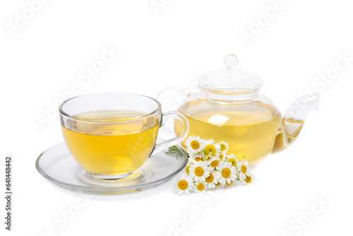 Herbal tea with fresh chamomile flowers isolated on white background. Calming and relaxing drink. Immunity.Cup and teapot of hot chamomile tea. Tea drinking concept. Tea ceremony.