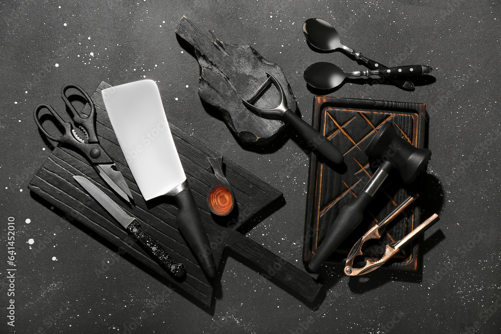 Fototapeta premium Different cutting boards and kitchen tools on grunge background