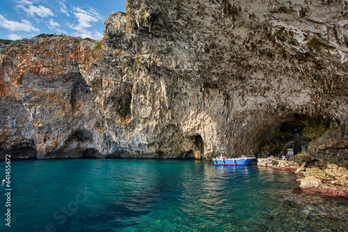 Grotta Zinzulusa. View from the cliff to the crystal clear azure Adriatic Sea with transparent water. gangway under the rocks to the cave. Salento region of Puglia Apulia photo