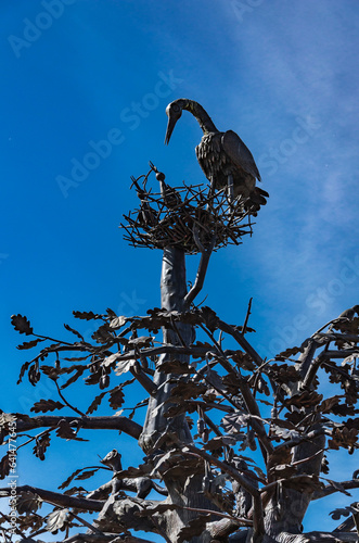 Russia, Zlatoust - September 2019: Bazhov Mountain Park, bronze sculpture of tree and animals.
