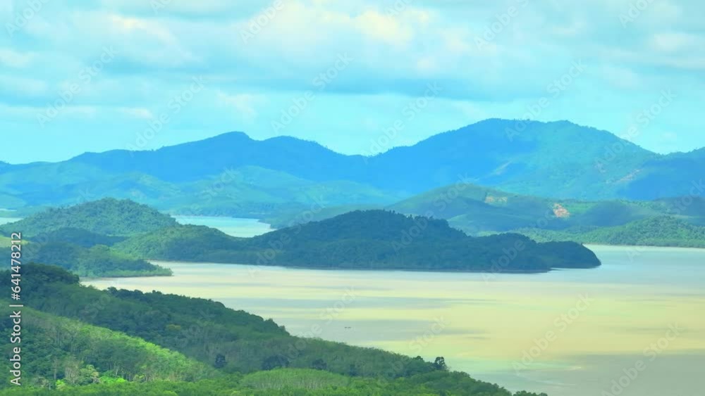 Drone captures intricate beauty: Mangrove forest, a tangle of resilient roots submerged in brackish water, meets the lush expanse of beach forest, where vibrant foliage embraces the sandy shoreline.
Drone captures intricate beauty: Mangrove forest, a tangle of resilient roots submerged in brackish water, meets the lush expanse of beach forest, where vibrant foliage embraces the sandy shoreline.