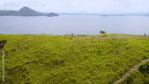 Aerial View Padar Island, Labuan Bajo, Indonesia. Capturing ocean and beautiful landscape of sky, hills and coastal beach.