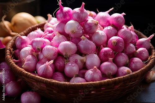 Large mountain of pink onions in a wicker basket