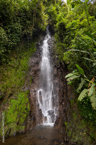 Water Flows Down the Rocks of the Waterfall