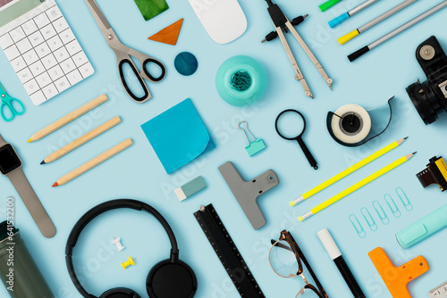 Office supply, stationary flat lay on blue background photo