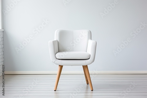 Studio shot of stylish chair with white top and light wooden legs standing on white