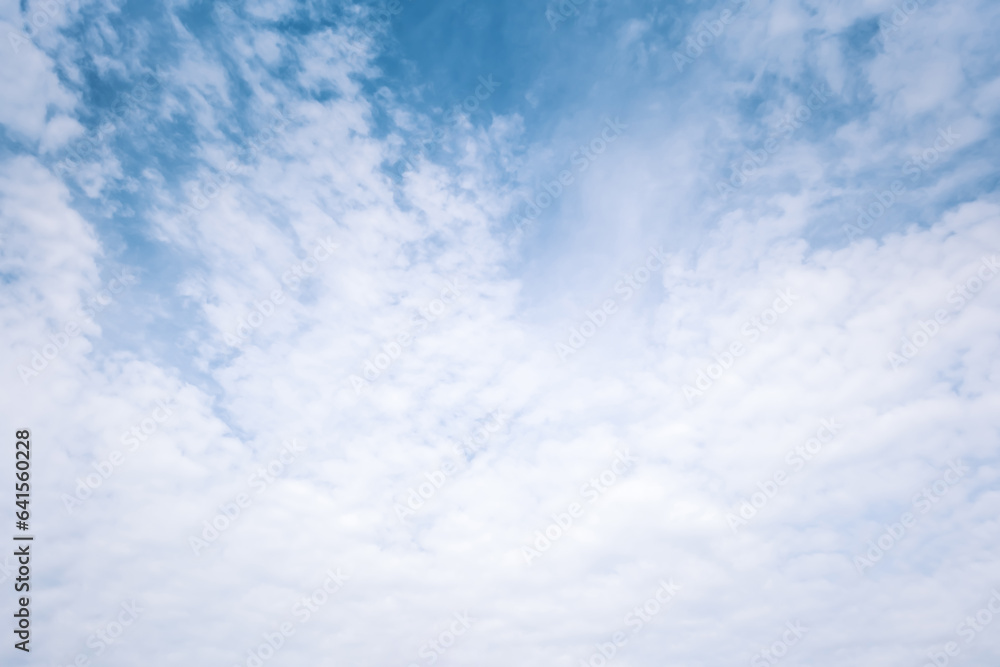 Texture of light clouds in the blue sky - cloudscape background