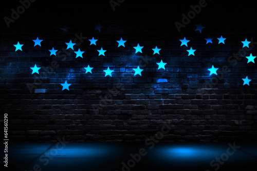 A dark and empty room with stars light on the wall