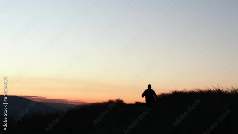 Video of a person running through the mountains of Peru at sunset. Concept of people, landscapes and nature. Video of a person running through the mountains of Peru at sunset. Concept of people, landscapes and nature.