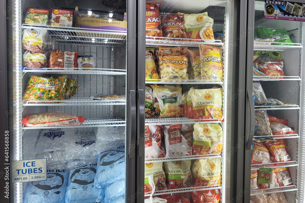 PENANG, MALAYSIA 28 AUG 2023 Inside a convenience store in Penang, a sizable refrigerator
