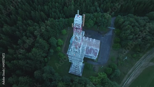 A tall radio receiver standing in the middle of the woods. Aerial view from a drone. Moravská Třebová, Hřebeč photo