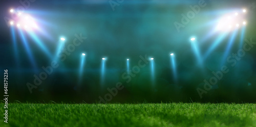 Green soccer field, bright spotlights, 
