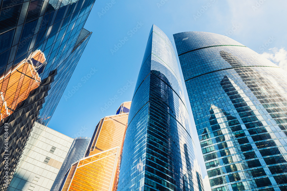 Modern glass skyscrapers against the blue sky. Moscow city, Russia.