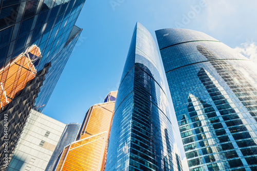 Obraz na płótnie Modern glass skyscrapers against the blue sky. Moscow city, Russia. w salonie