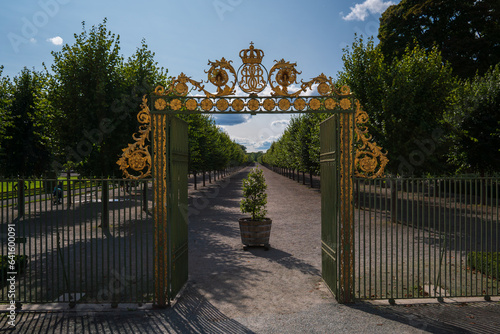 Golden fence at a park entrance near Drottningholm castle, Sweden