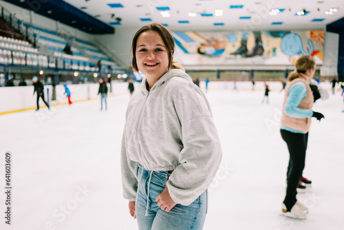 happy girl at christmas skating rink