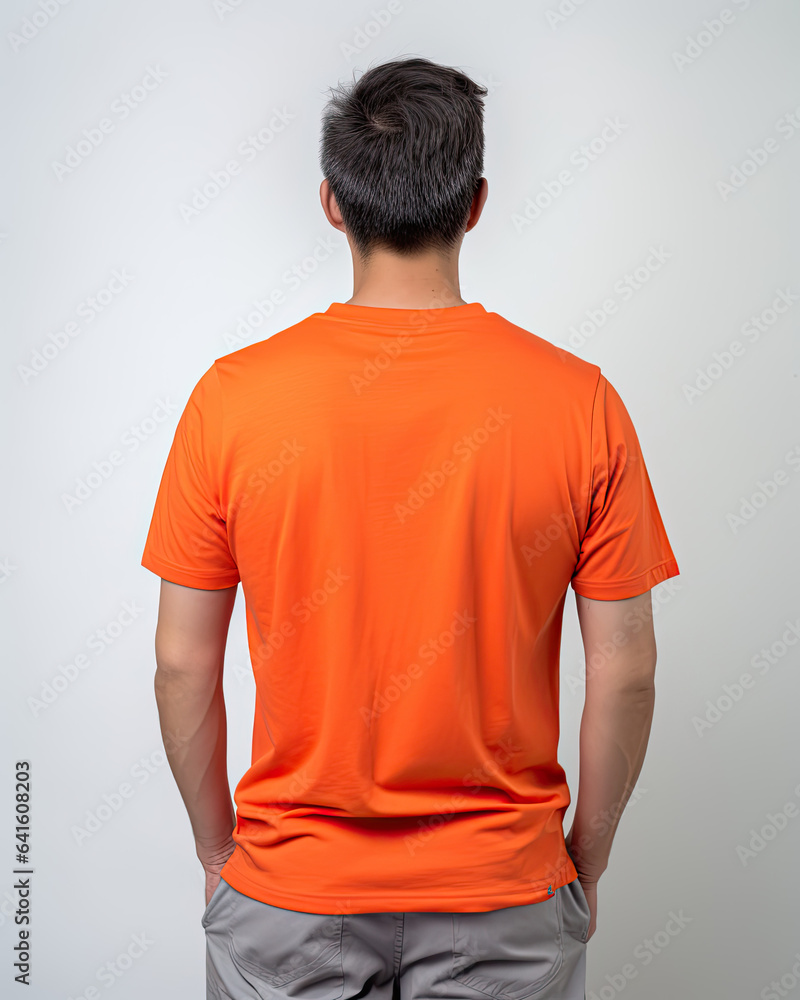 Man in orange t-shirt for design showcase, back view Man in orange t-shirt for design showcase, back view