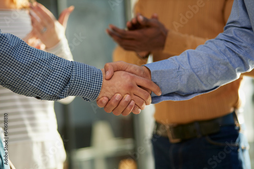 Hands of multi-ethnic people shake hands close up view