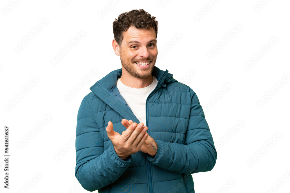 Brazilian man over isolated chroma key background applauding after presentation in a conference Brazilian man over isolated chroma key background applauding after presentation in a conference