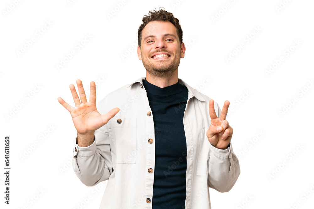 Brazilian man over isolated chroma key background counting seven with fingers Brazilian man over isolated chroma key background counting seven with fingers