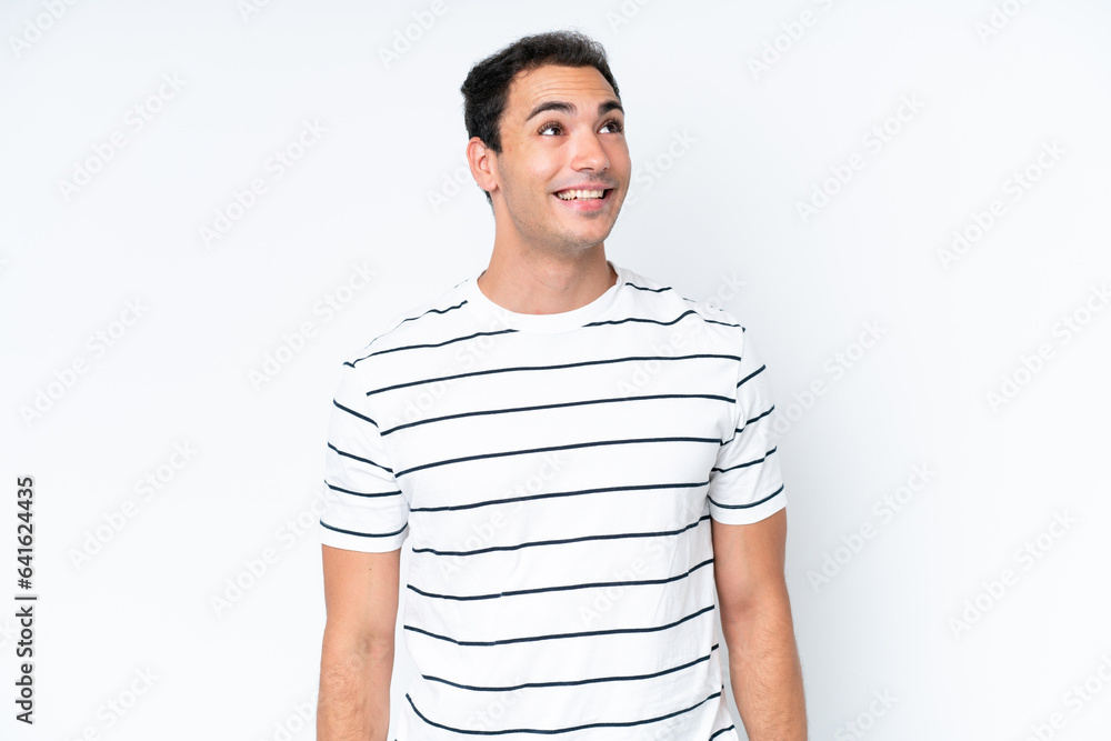 Young caucasian man isolated on white background thinking an idea pointing the finger up Young caucasian man isolated on white background thinking an idea pointing the finger up