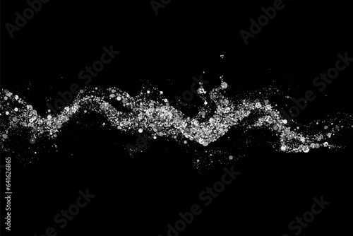 Silver wavy design element with glitter effect on black background, wave of silver sparkles.