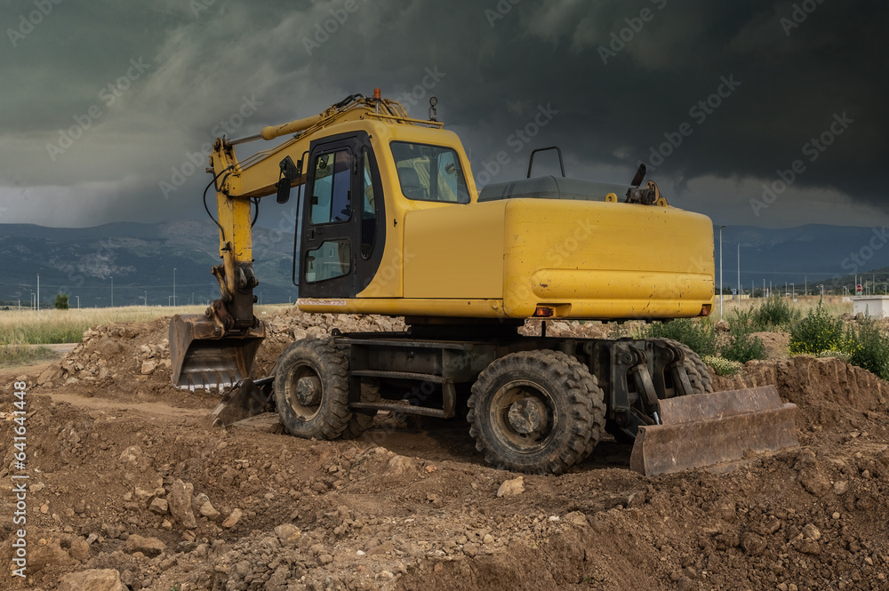 Excavator at a construction site at the end of the day