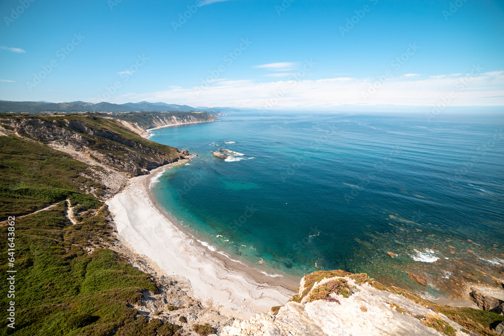 Tranquil paradise: Aerial view of Cabo Vidio beach emanates serenity and pure bliss. Tranquil paradise: Aerial view of Cabo Vidio beach emanates serenity and pure bliss.