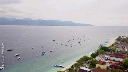 Aerial view of Gili Trawangan, West Nusa Tenggara. Panoramic showcasing architecture, coastal, boats, beach, and natural beauty.