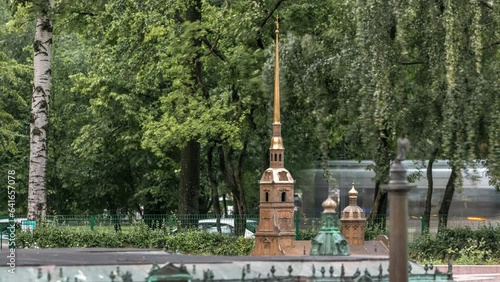 Enchanting Alexander Park Miniature City Timelapse in St. Petersburg: Intricate Model of Peter and Paul Cathedral Amidst Lush Greenery. photo