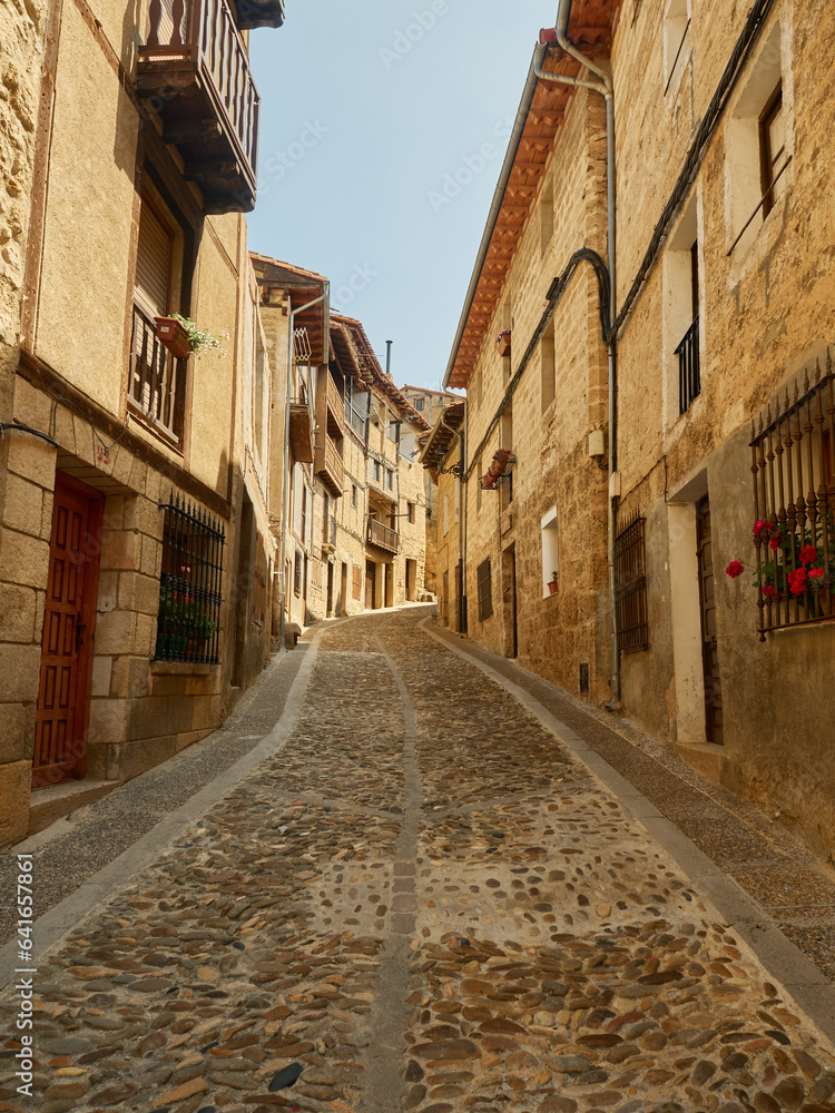 Typical medieval street of Spanish village of Frías      