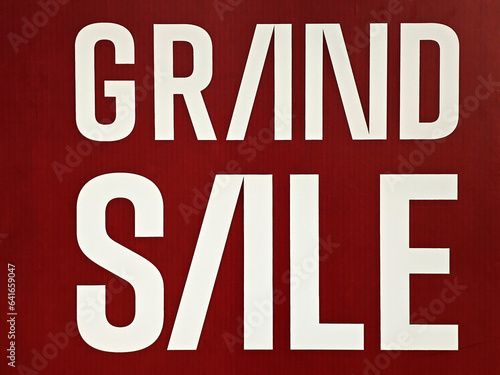 Grand Sale Sign on the Red Background.