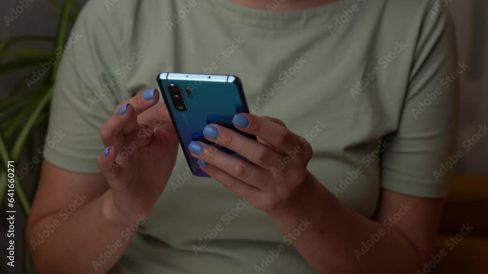 Woman is using smartphone, writing a message, browsing social networks. Woman is using smartphone, writing a message, browsing social networks.