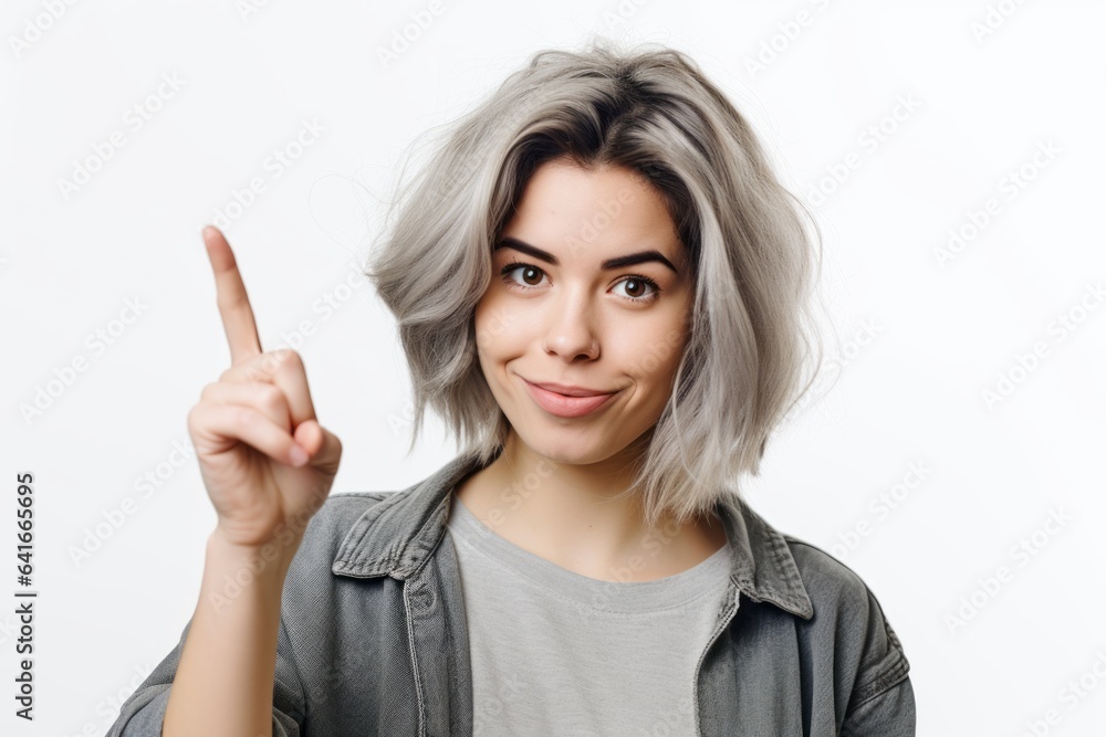 Close-up portrait photography of a glad girl in her 20s making a i have an idea gesture with a finger up against a white background. With generative AI technology Close-up portrait photography of a glad girl in her 20s making a i have an idea gesture with a finger up against a white background. With generative AI technology